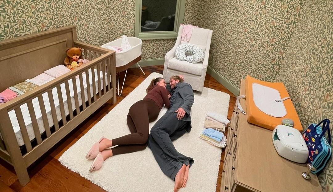 Nina and Logan laying in the nursery together