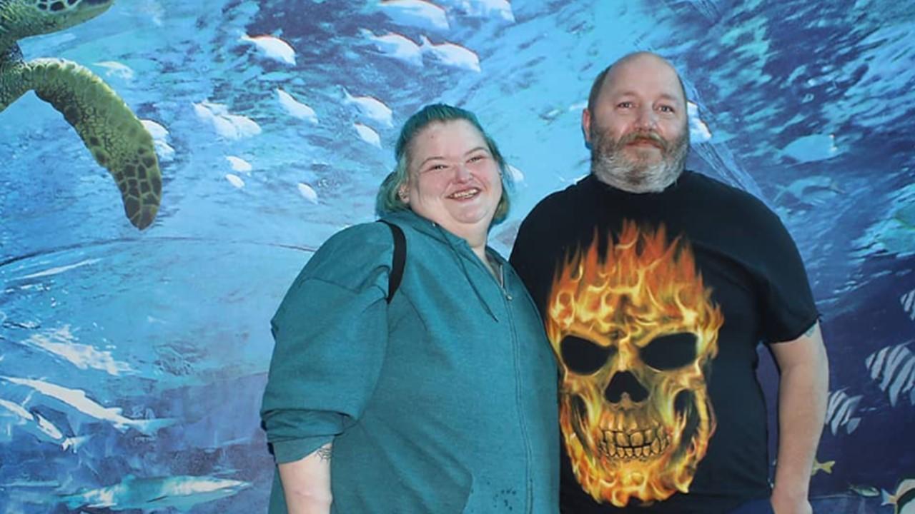 Amy Slaton and Michael Halterman at an aquarium