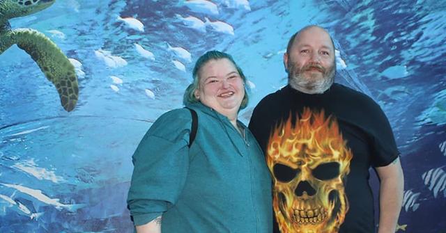 Amy Slaton and Michael Halterman at an aquarium