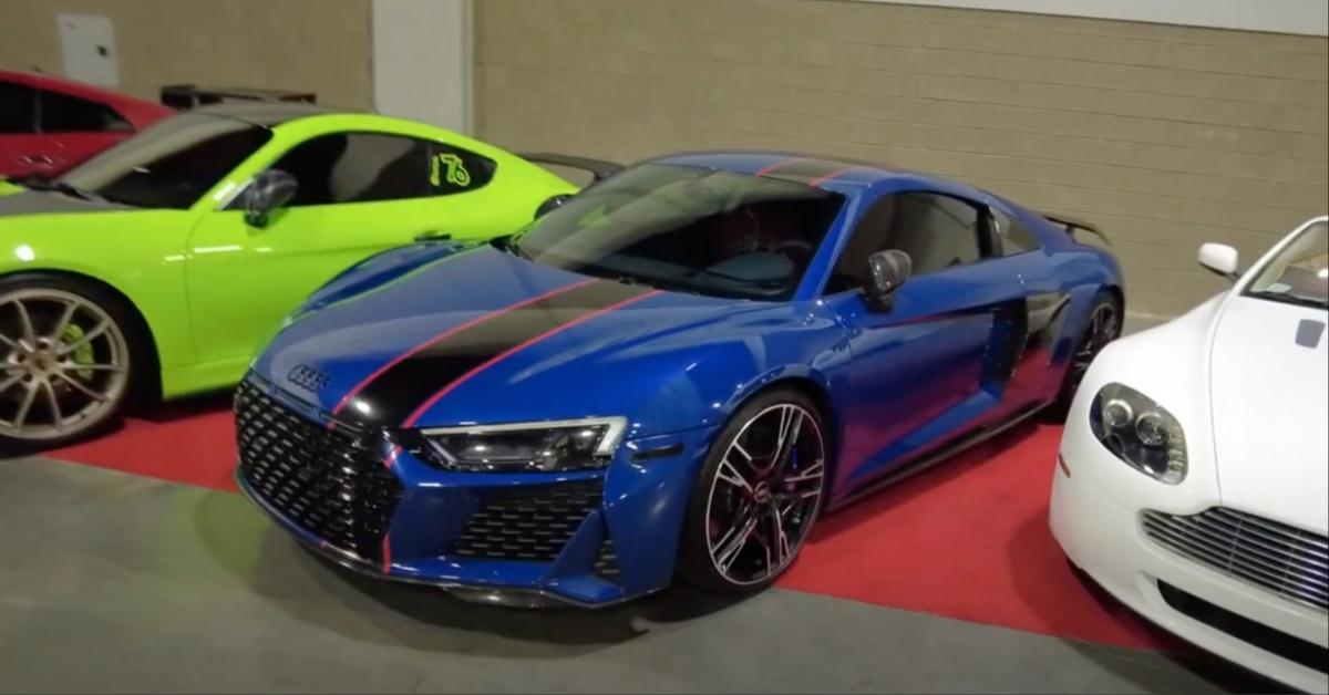 Several of Young Dolph's cars are displayed at DJ Envy's 2023 car show. 