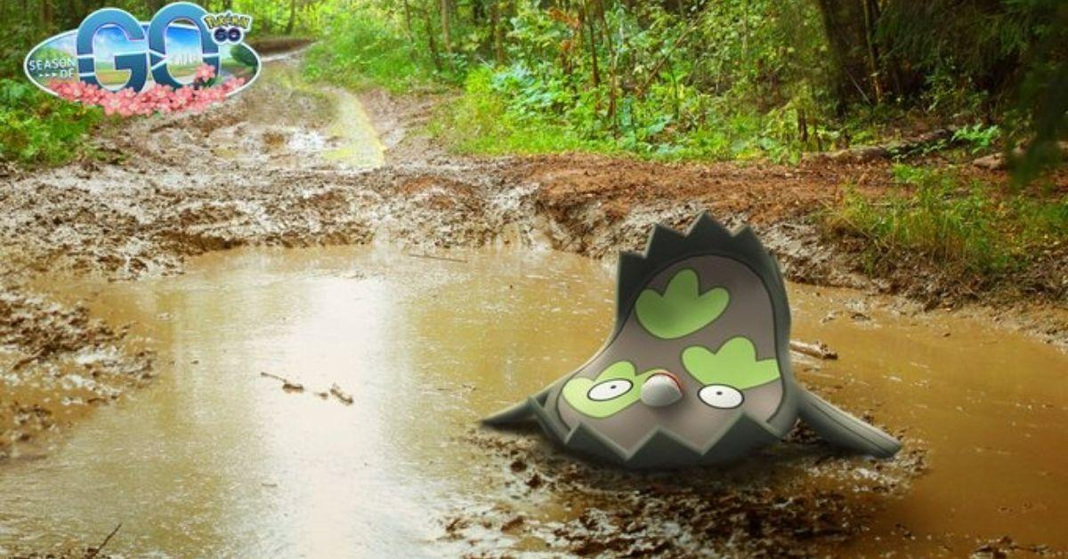 Stunfisk from Pokémon GO sitting in a mud puddle.