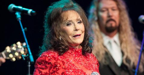 Loretta Lynn singing on stage