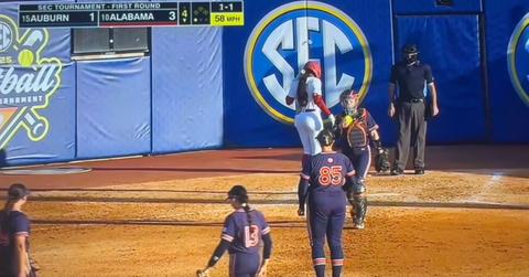 Why Does the Auburn Catcher Walk the Ball to the Pitcher?