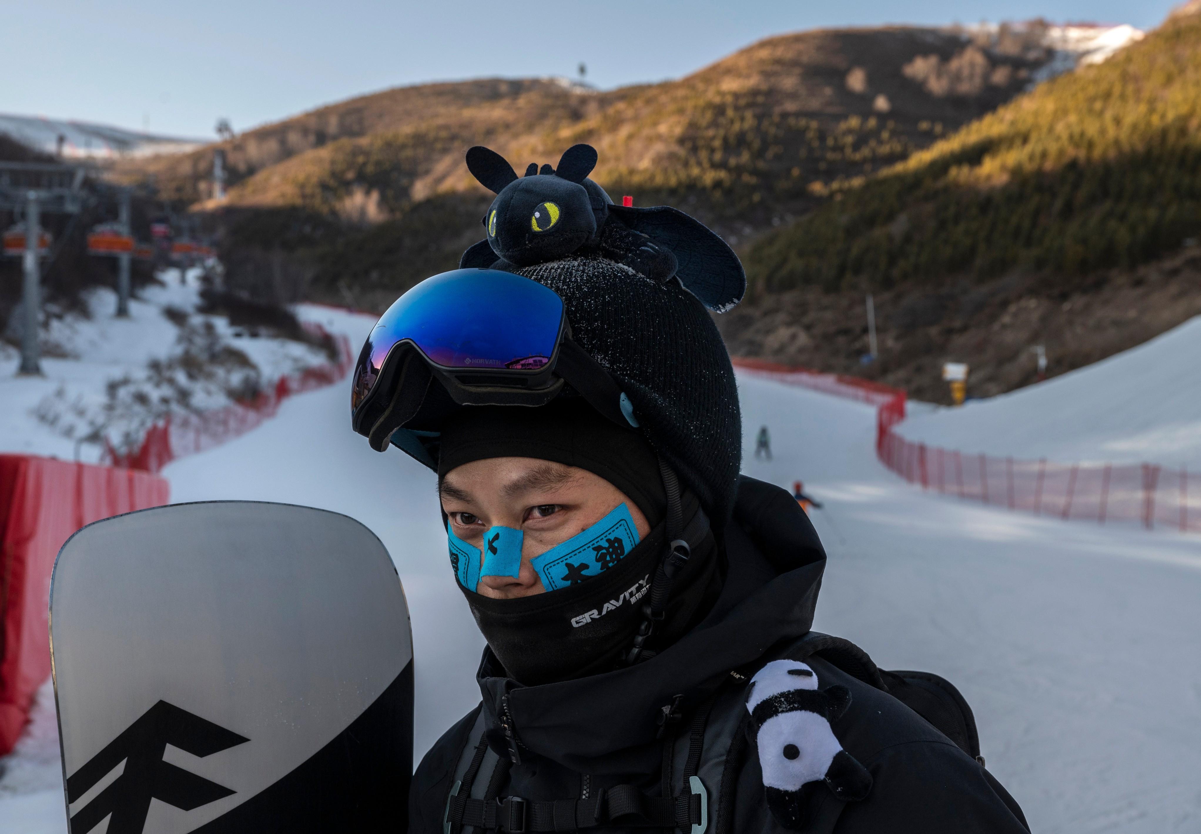 skier wears tape on face