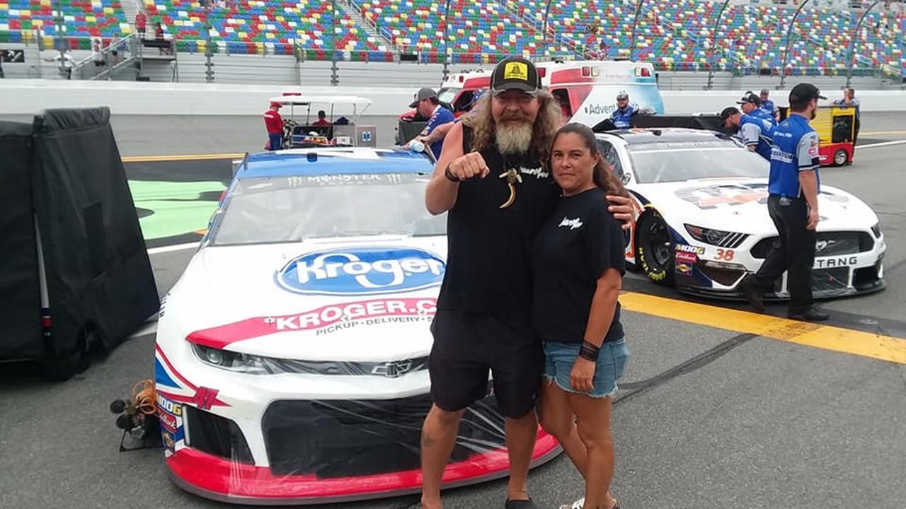 Dusty Crum and Natalee Mckinney at a race track