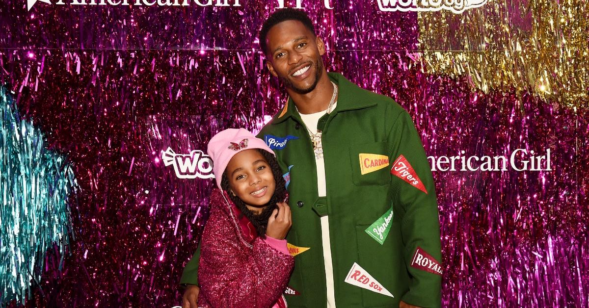 Victor Cruz and his daughter, Kennedy, attend an American Girl fashion event on Sept. 23, 2021 