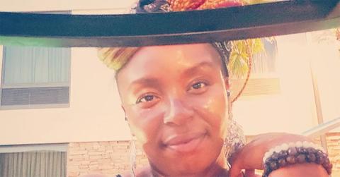 Jaguar Wright with a black bar near her forehead.