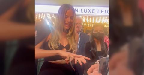 Margot Robbie doing sign language