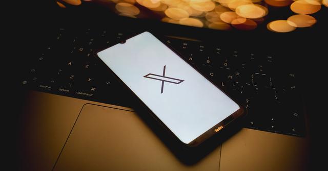 The X logo on a smartphone