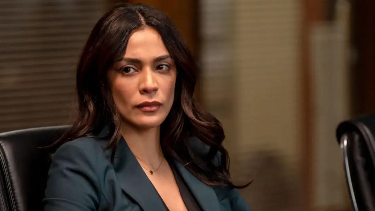 ADA Sam Maroun in a dark green suit on 'Law & Order'