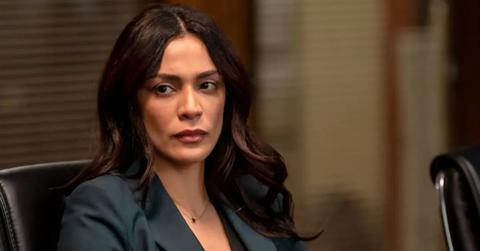 ADA Sam Maroun in a dark green suit on 'Law & Order'