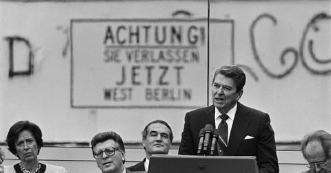 Ronald Reagan giving a speech at the Berlin Wall.