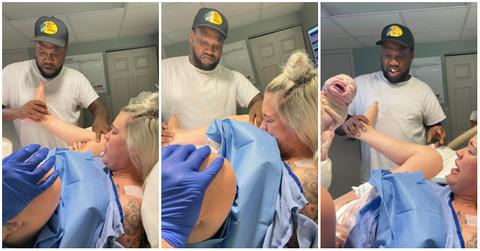 Man looks confused as his partner gives birth to their daughter.