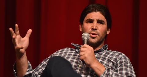 Kevin Turen speaking into a mic after a '99 Homes' screening.
