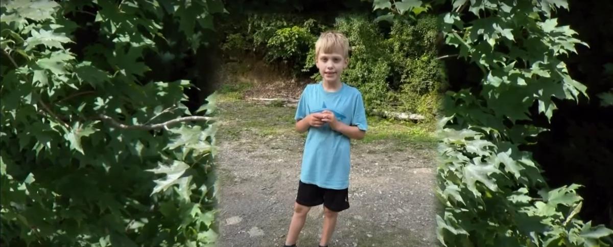 10-year-old Jayden Spicer in a blue T-shirt prior to going missing.