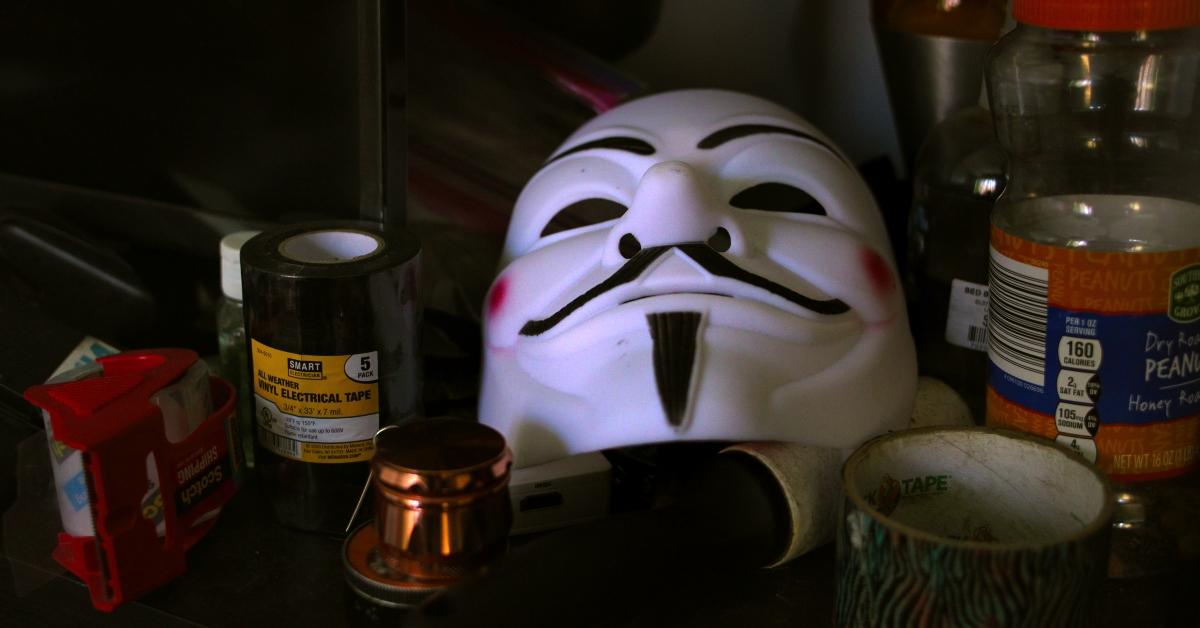 An Anonymous mask from 'The Antisocial Network: Memes to Mayhem'