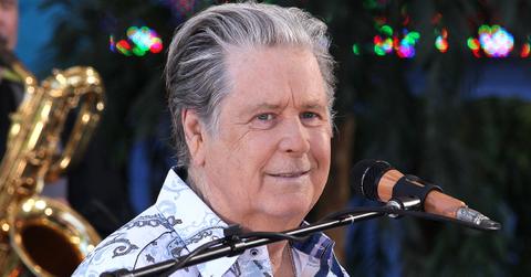 Brian Wilson singing on stage.
