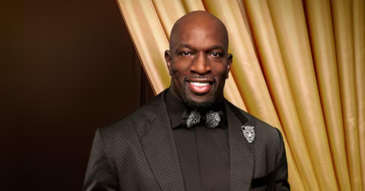 Thaddeus Bullard in a black suit for 'King's Court' promo.