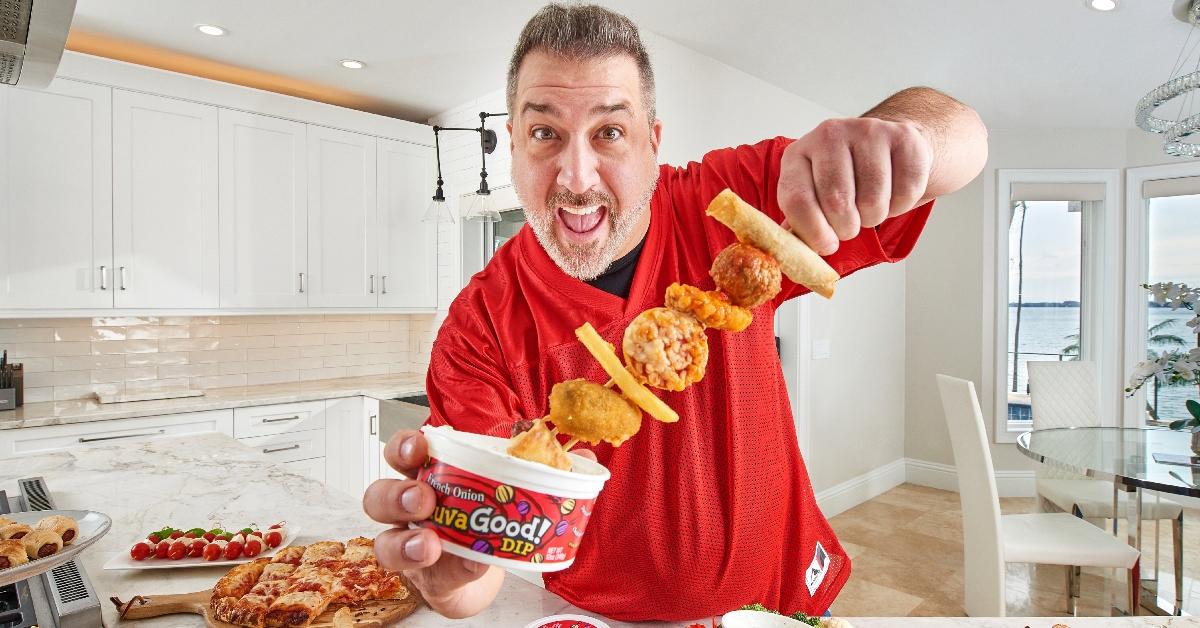 Joey Fatone dips food into Heluva Good! dip 