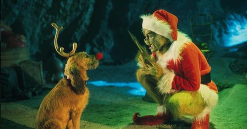 The Grinch, played by Jim Carrey, talking to his dog Max