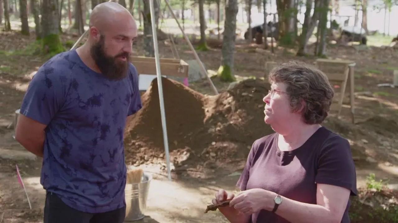 Jack Begley and Helen Sheldon speaking on a dig site 'Curse of Oak Island'