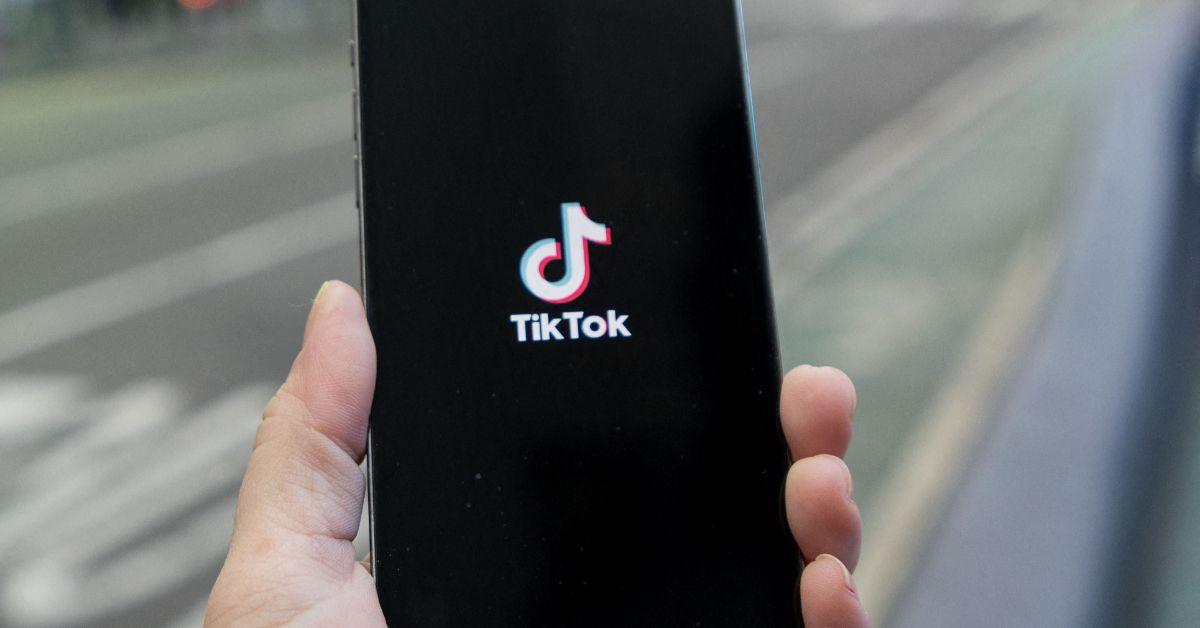 The TikTok logo on a phone screen. 