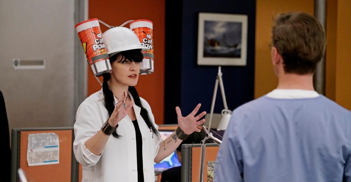 Abby wears a beverage hat in the lab while talking to Jimmy on NCIS.