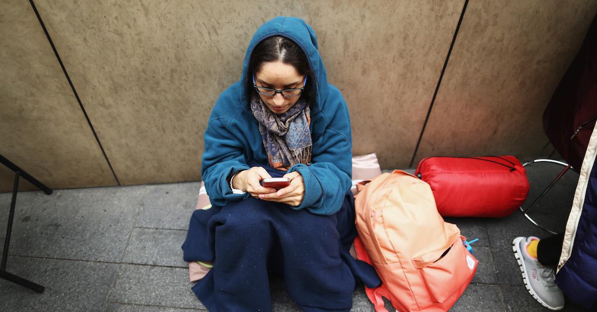 A woman using iPhone 