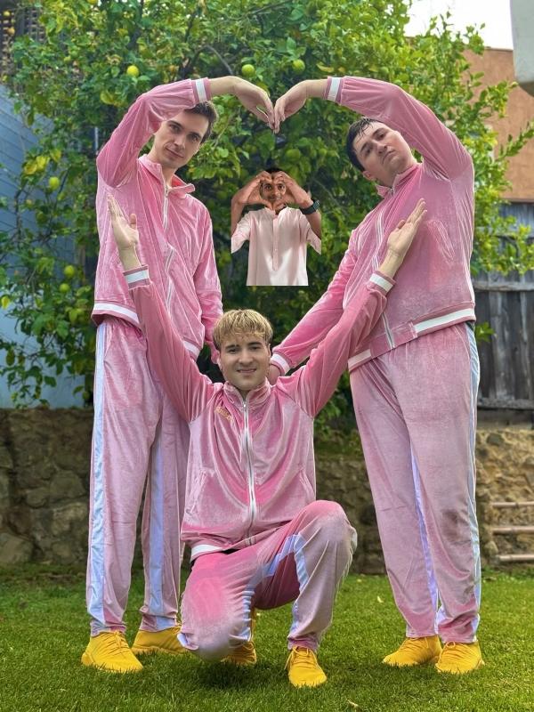 The members of Boy Throb form a heart together outside of their Los Angeles home.