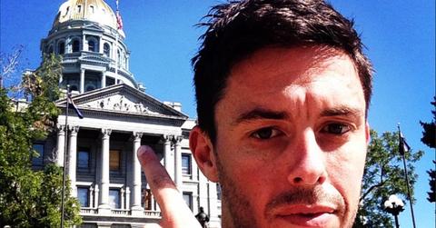 Tim Miller poses in front of the White House