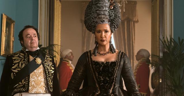 (L-R) Hugh Sachs as Brimsley, Golda Rosheuvel as Queen Charlotte in 'Queen Charlotte: A Bridgerton Story'