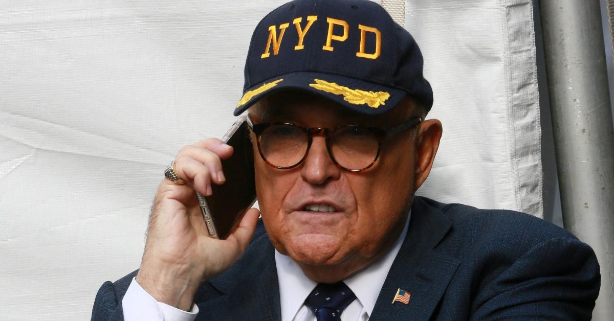 Rudy Giuliani wearing NYPD hat