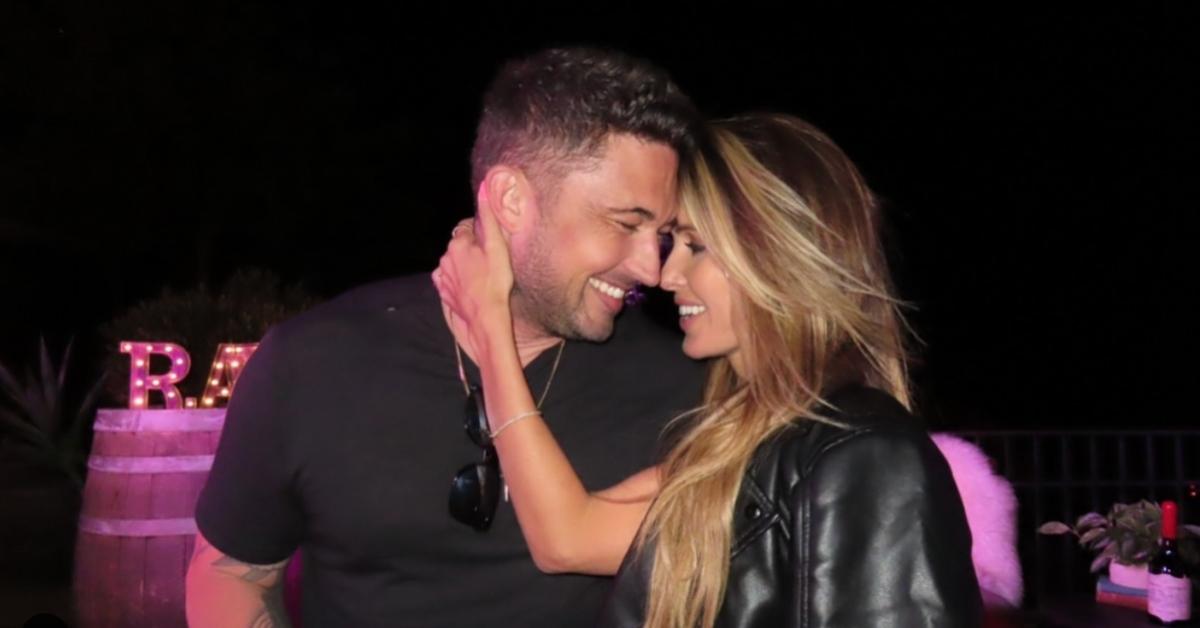 Audrina Patridge and her boyfriend, Michael Ray, share an intimate moment.