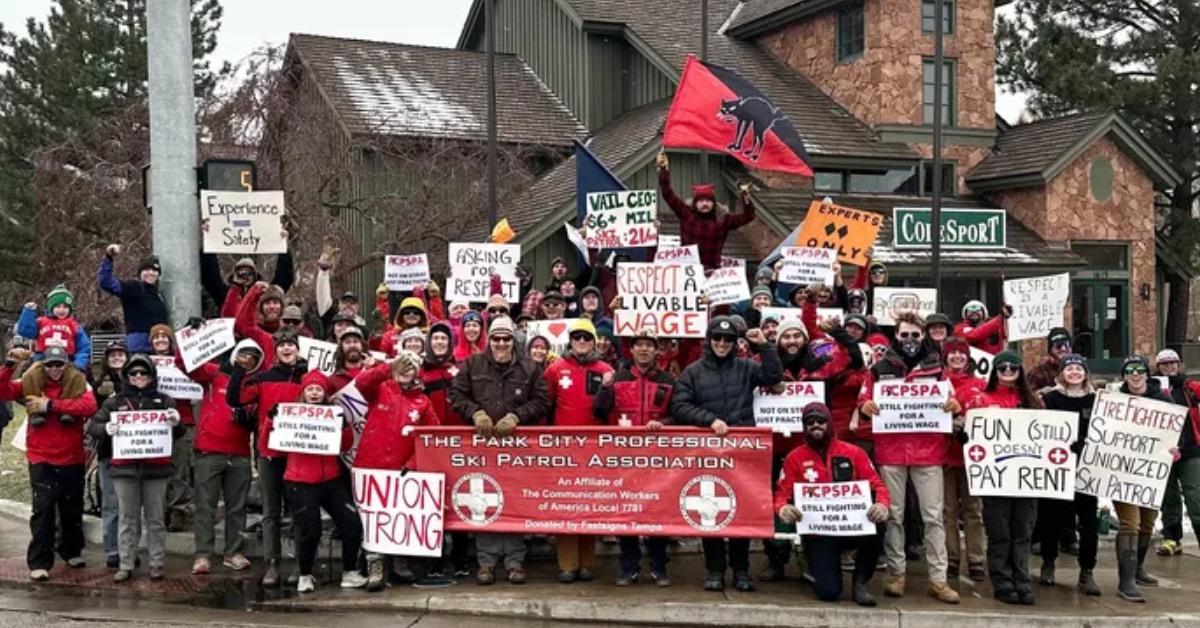 Park City Professional Ski Patrol Association holding their signs while on strike.