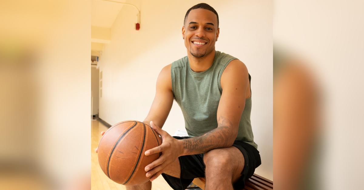 Grant Ellis poses with a basketball on 'The Bachelor.'