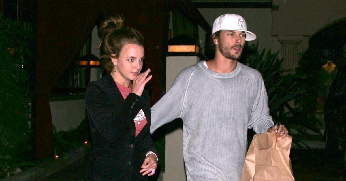 (l-r): Britney Spears and Kevin Federline walking outside at an event