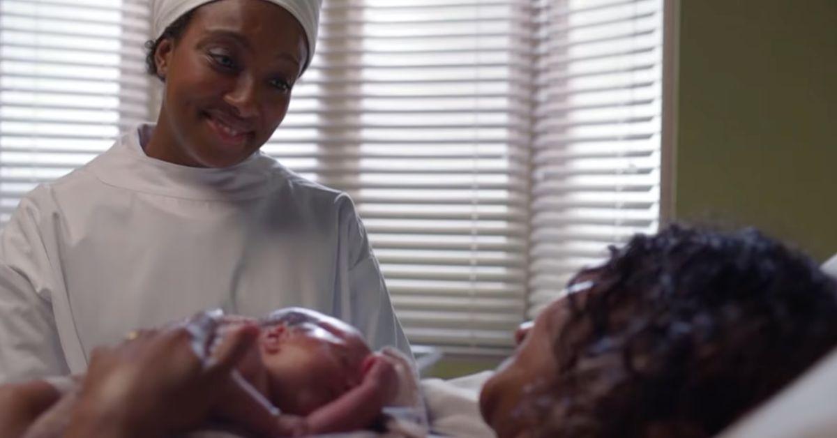 A Midwife Assisting a Patient