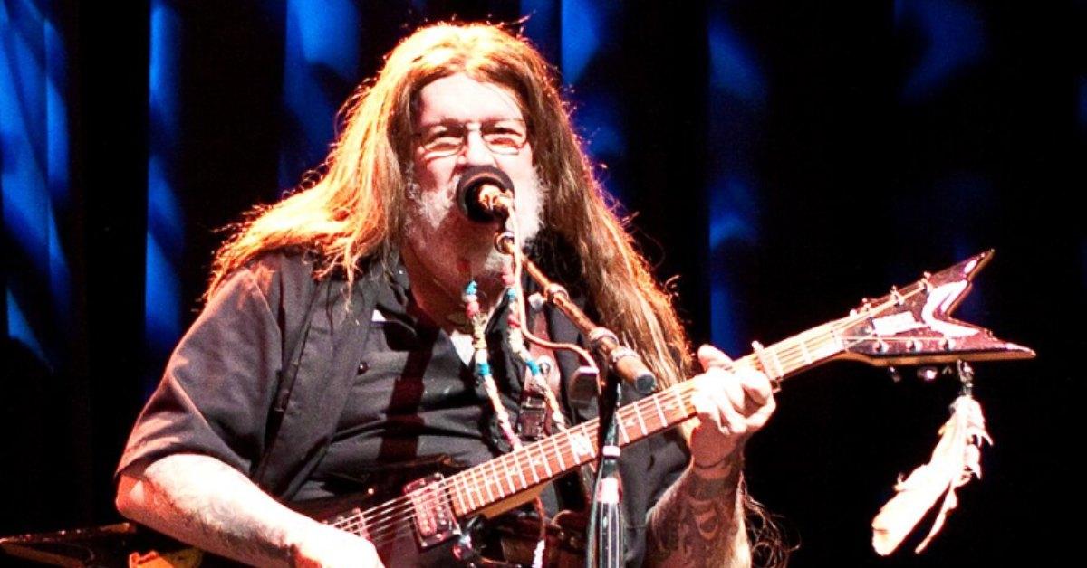 David Allen Coe performing on stage.