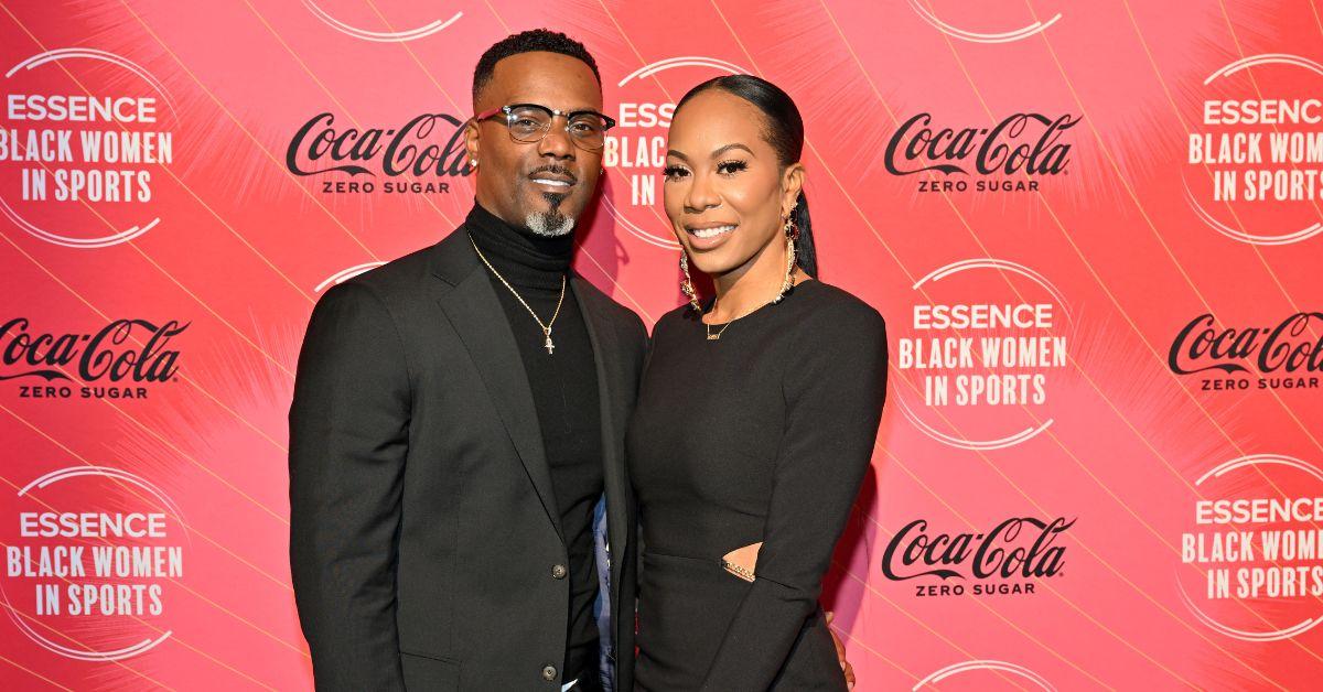 (l-r): Aaron Ross and Sanya Richards-Ross hugging on the red carpet.