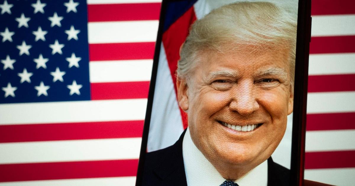 A picture of President Donald Trump with the American flag in the background