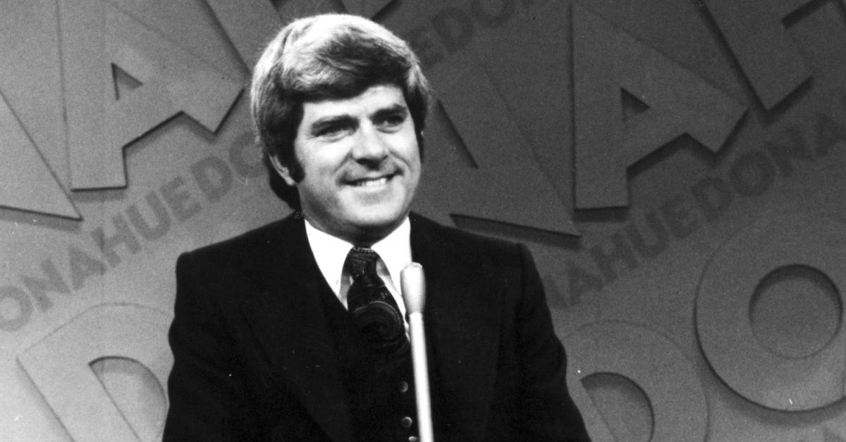 Phil Donahue smiles while holding a microphone during a taping of his show in Cincinnati in 1970.