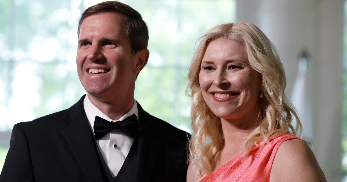 Kentucky Governor Andy Beshear (L) and his wife Britainy Beshear arrive for the White House state dinner for South Korean President Yoon Suk-yeol 