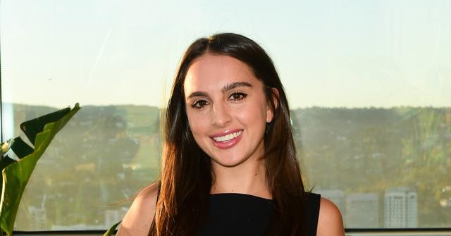 Alexia Umansky wearing a black dress