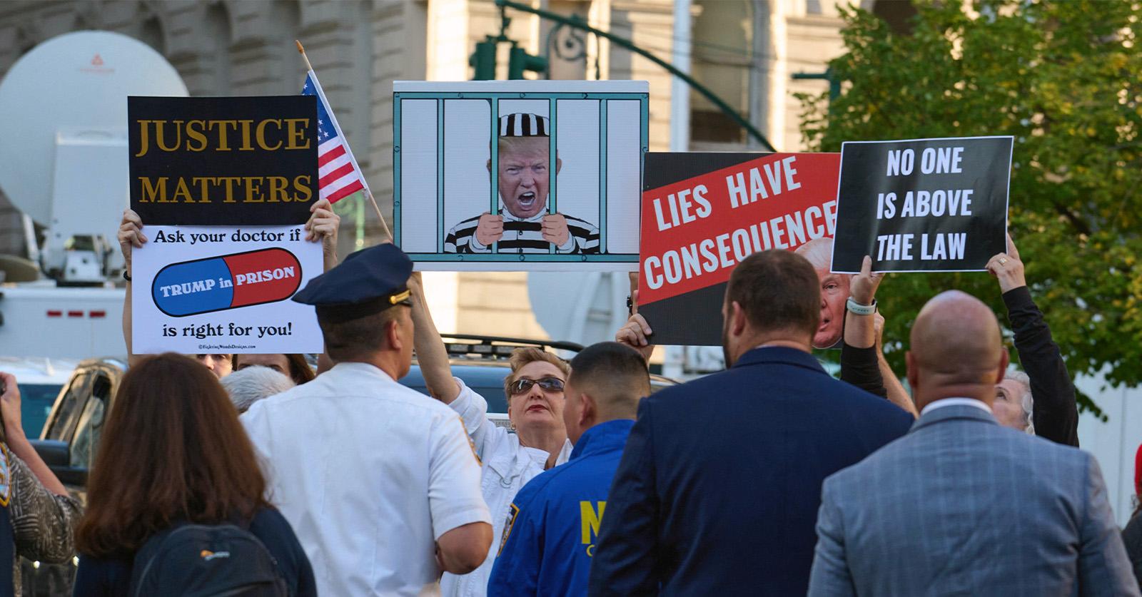 trump jail signs