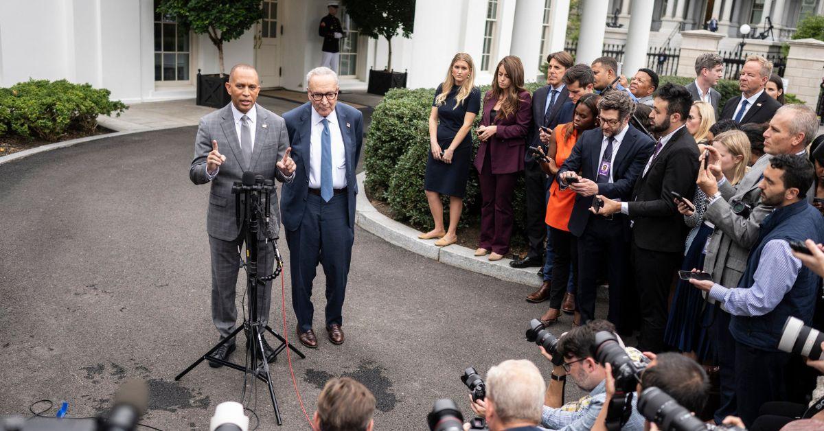 Hakeem Jeffries and Chuck Schumer addressing reporters outside the White House. 