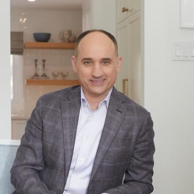 david visentin from love it or list it sitting in a chair