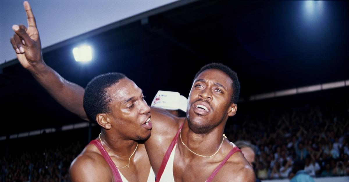 Butch Reynolds of the USA (right) with brother Jeff acknowledges the crowd after winning the 400 Metres event 