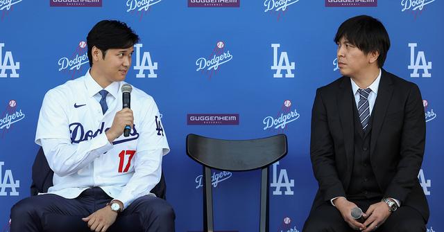 Shohei Ohtani answers questions and Ippei Mizuhara translates during the Shohei Ohtani Los Angeles Dodgers Press Conference at Dodger Stadium on Thursday, December 14, 2023 in Los Angeles, California. (Photo by Rob Leiter/MLB Photos via Getty Images)