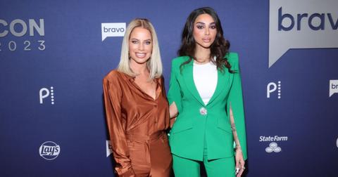 Caroline Stanbury and Sara Al Madani pose for photo together during BravoCon 20234