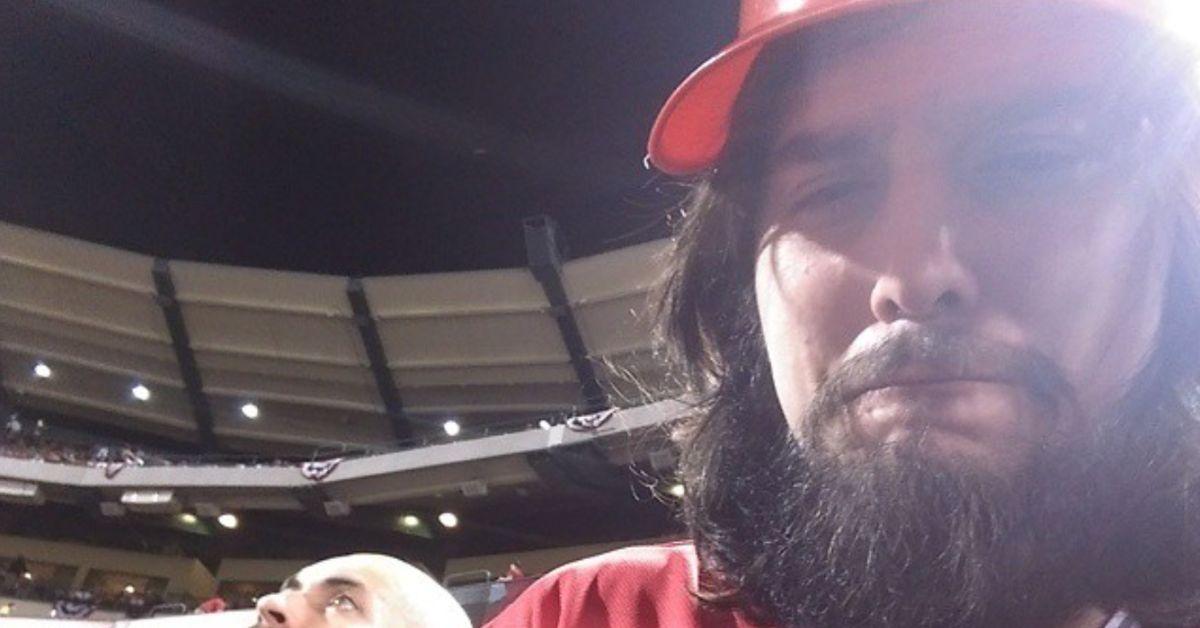 Mang0 choking up at a baseball game. 